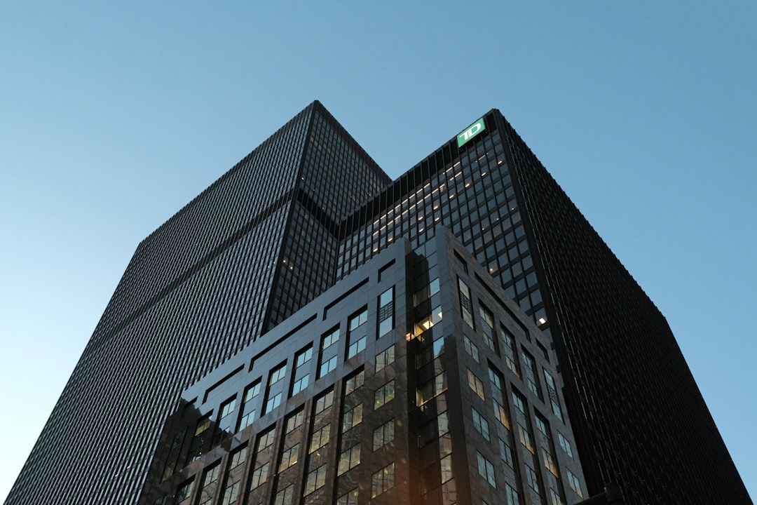 Services-02 modern-skyscrapers-against-a-clear-blue-sky-mcxbfxsghne